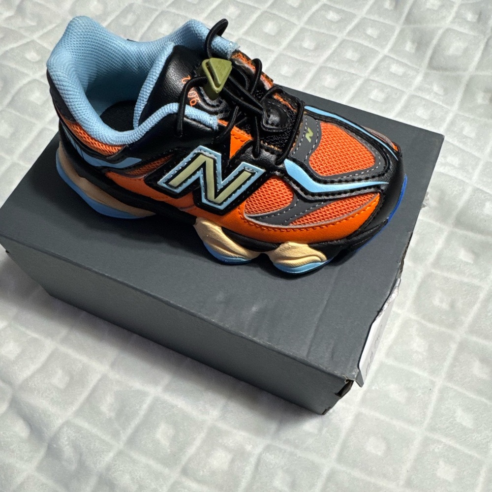 New Balance Kids' Vibrant Orange and Black Sneakers